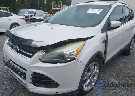 2013 Ford Escape Titanium z USA, uszkodzony, nr VIN 1FMCU0J99DUB43909